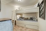 Third bedroom/den offers built0in bunk beds with pull out trundle and wall mounted tv. 